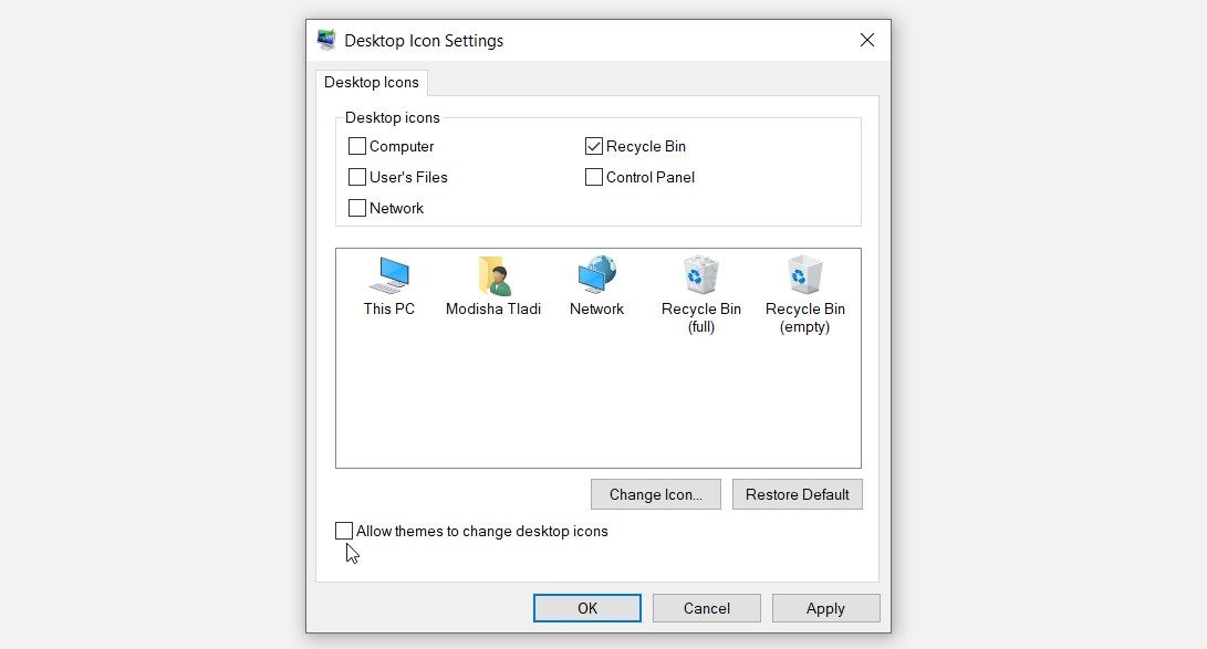 Unchecking the “Allow Themes to Change Desktop Icons” Option