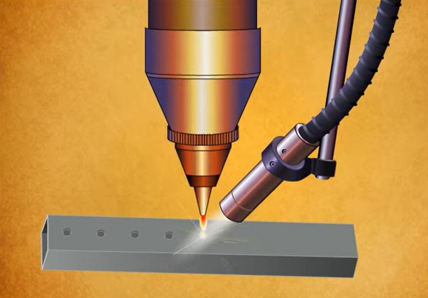 YAG laser cutter being used to drill holes in a metal