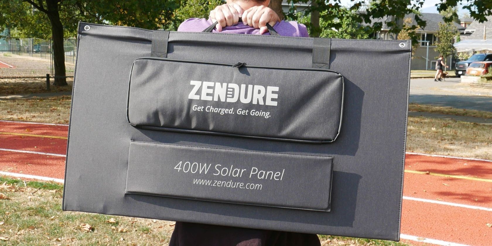 Zendure 400W Solar Panel Man Carrying Portable Solar Panel on His Back Featured Image