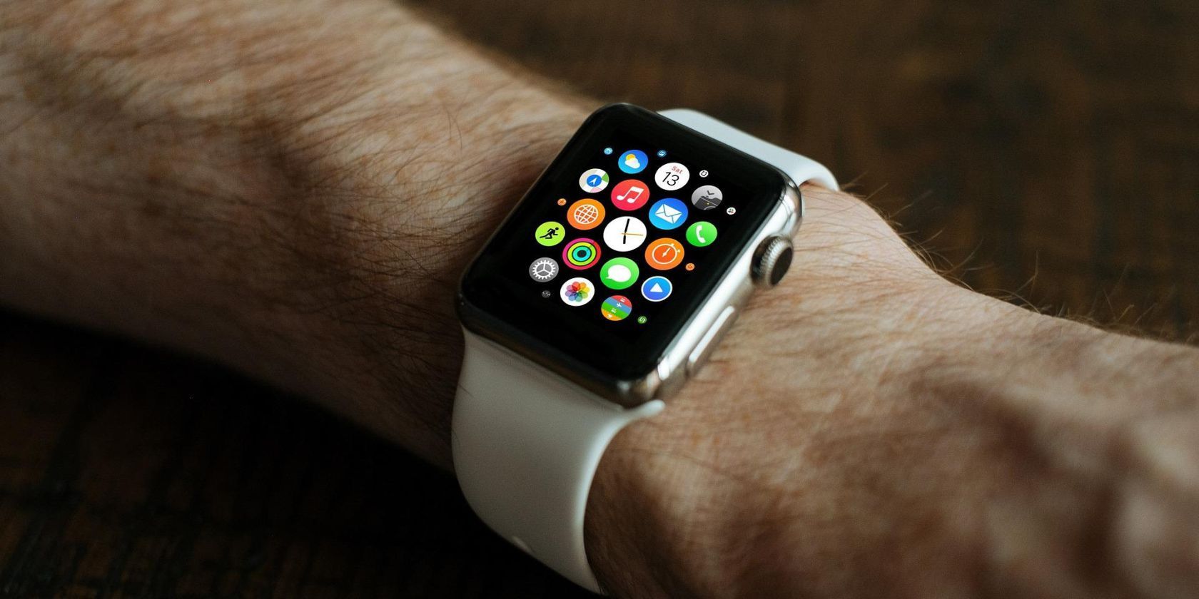 A man wearing an Apple Watch on his wrist