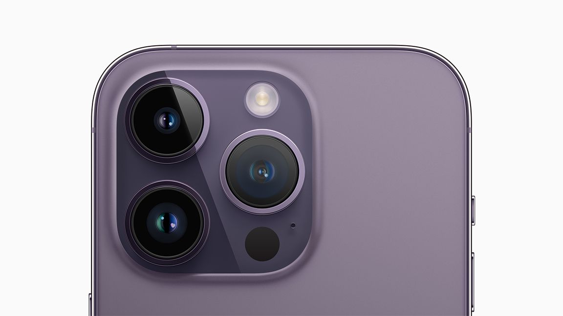 Camera module on a purple iPhone 14 Pro