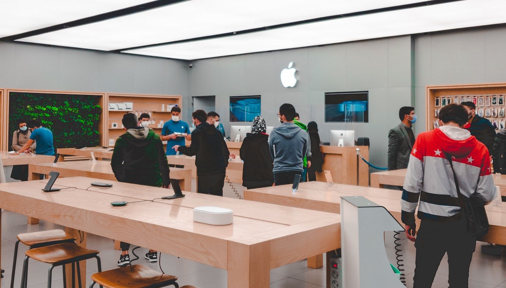 Photo of people in an Apple Store.