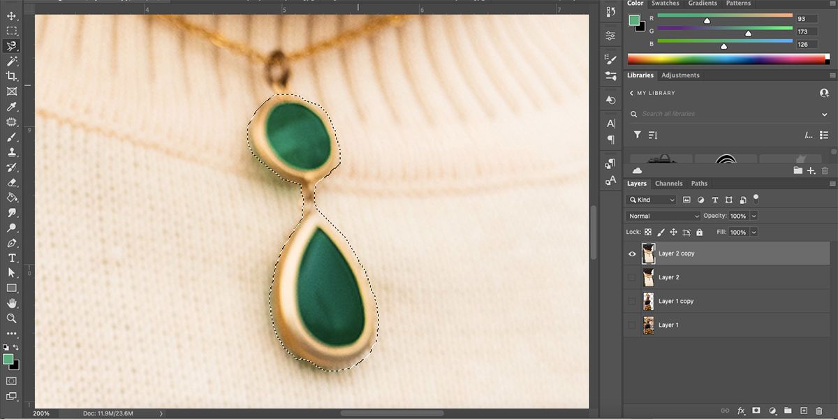 Zoomed in Photoshop artboard with necklace pendant selected.