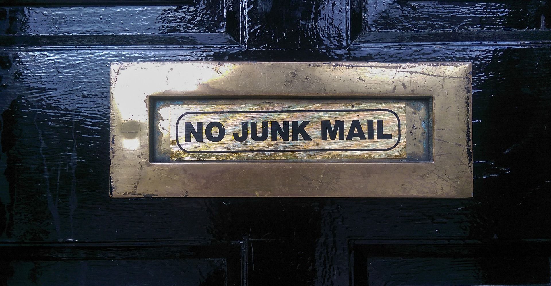 letterbox with sign saying "no junk mail"