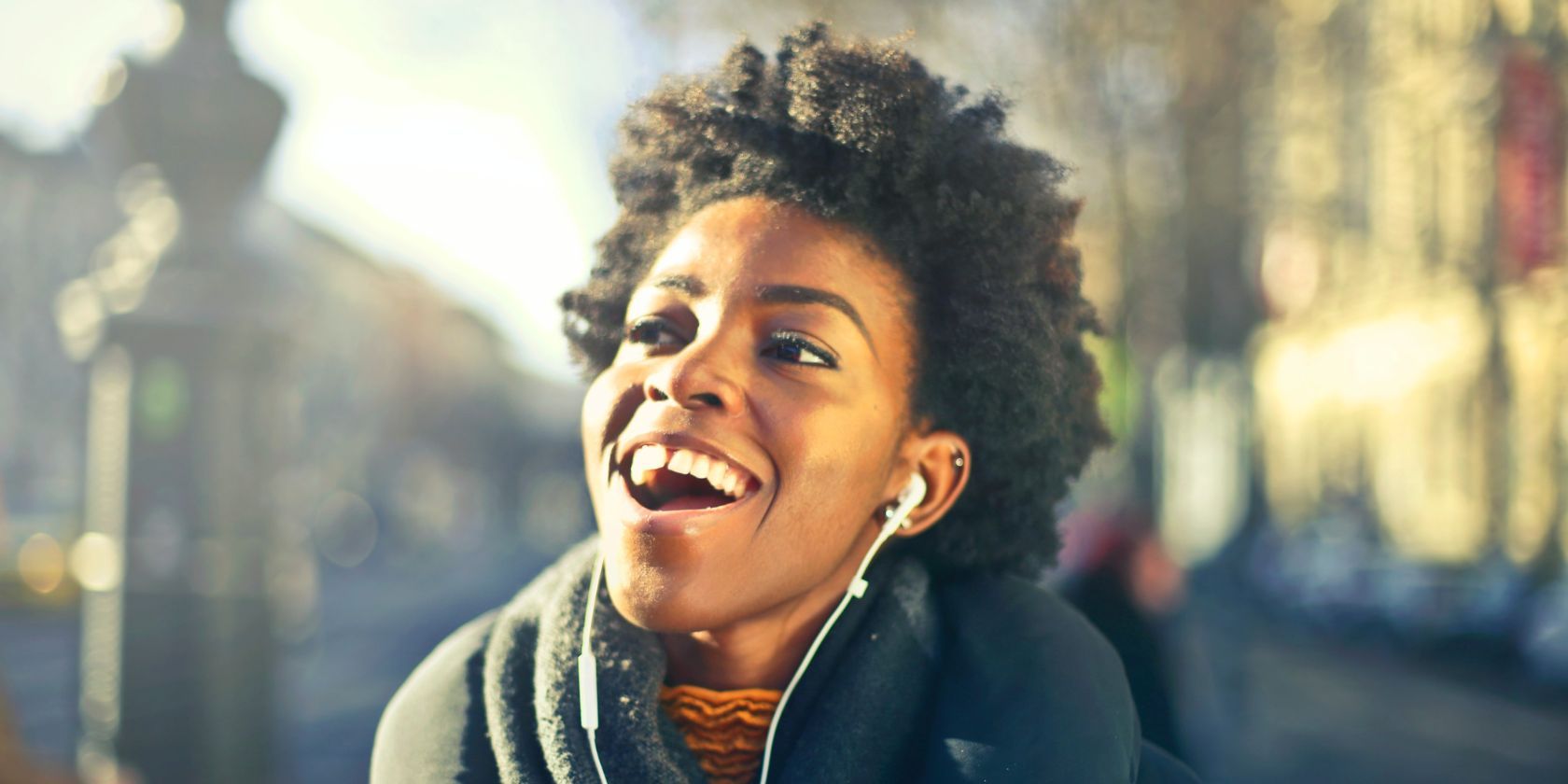Woman with earbuds in