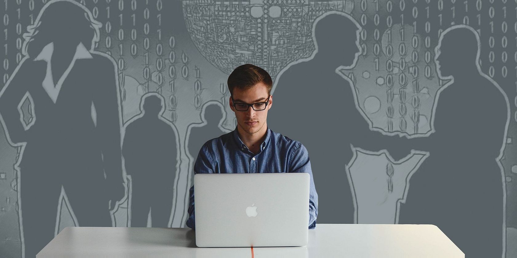 man working on his PC with background of people's shadows in business situations