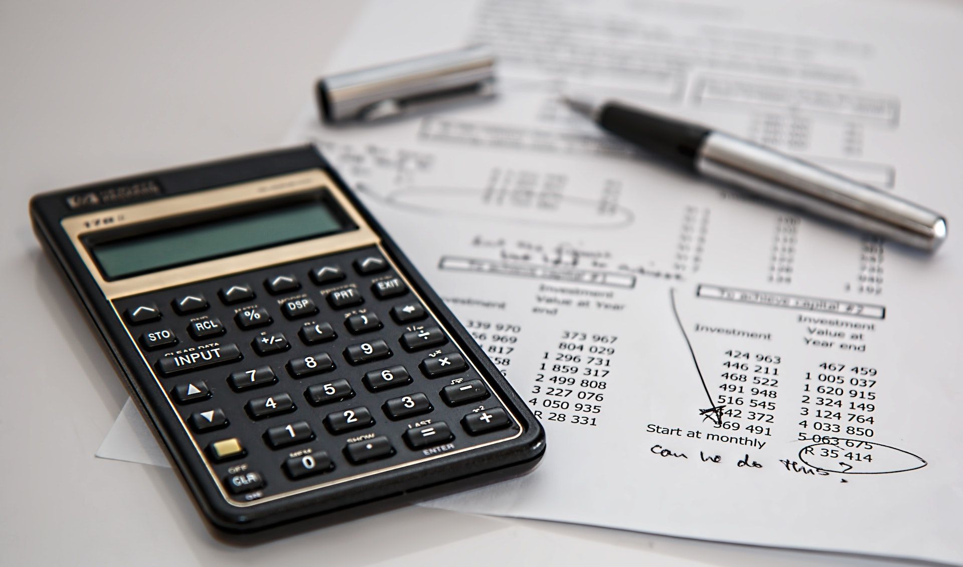 Planning Finances on Paper With a Calculator