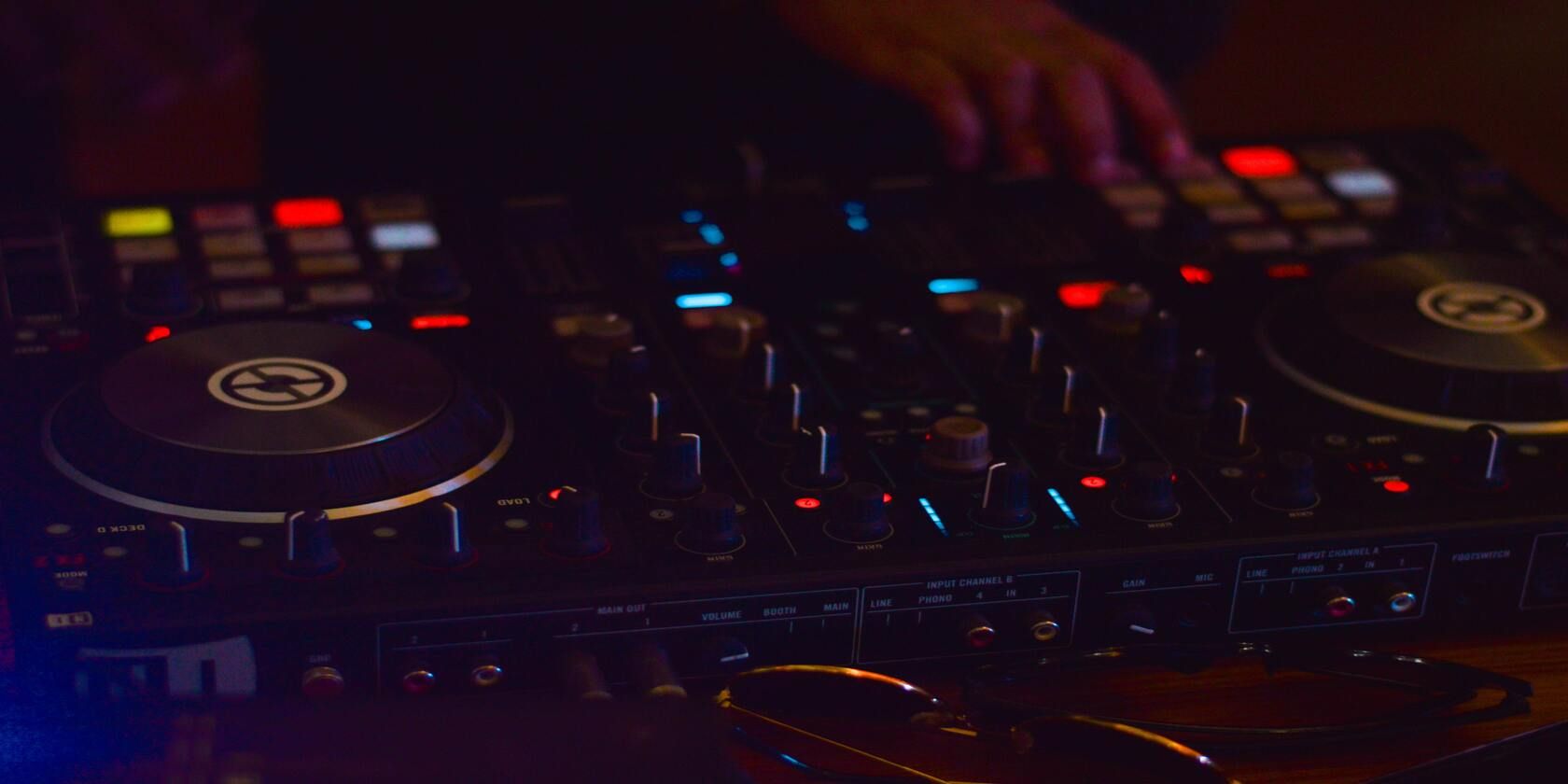Close-up of DJ mixer controls