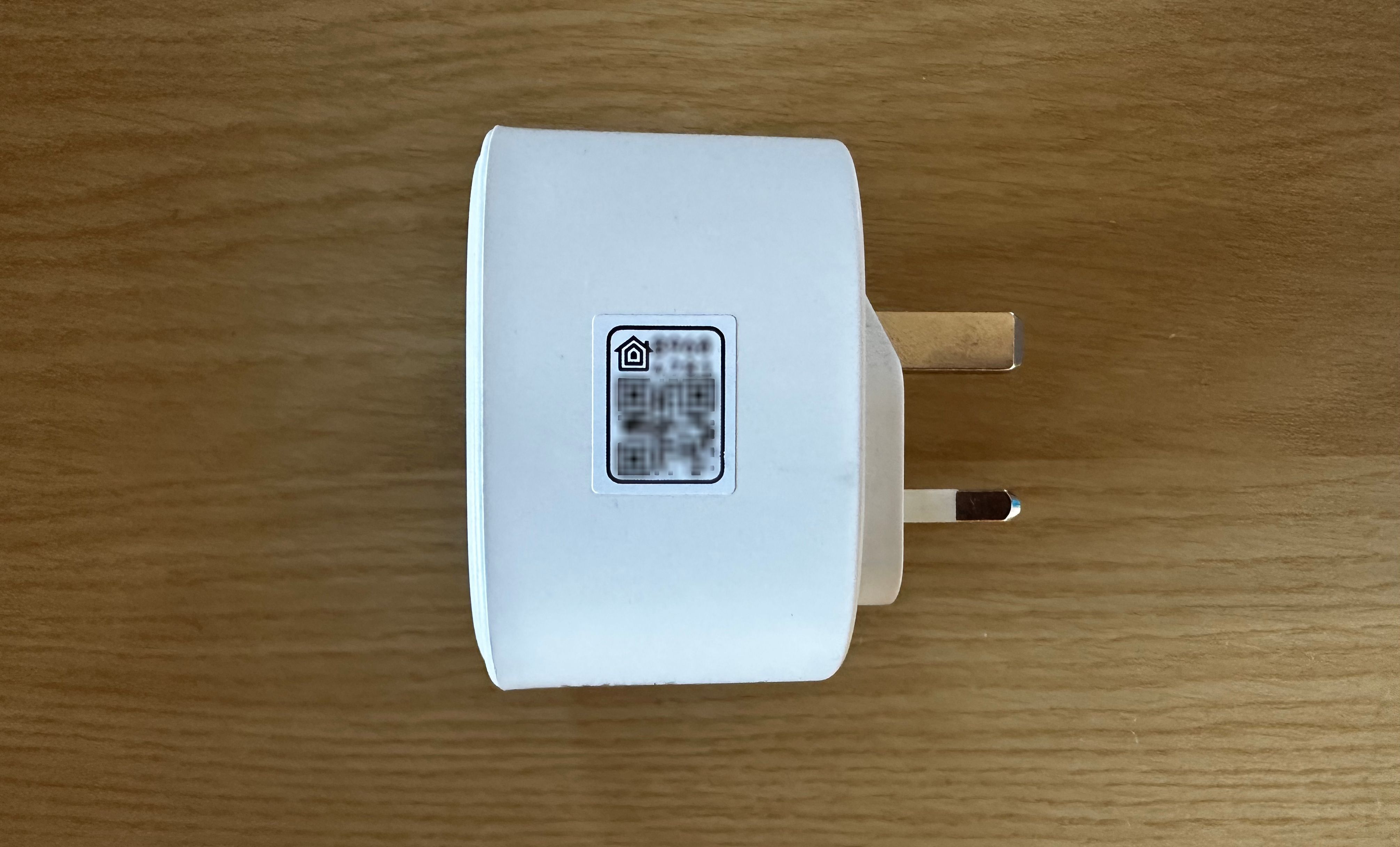 Close up of the HomeKit QR code on a smart plug