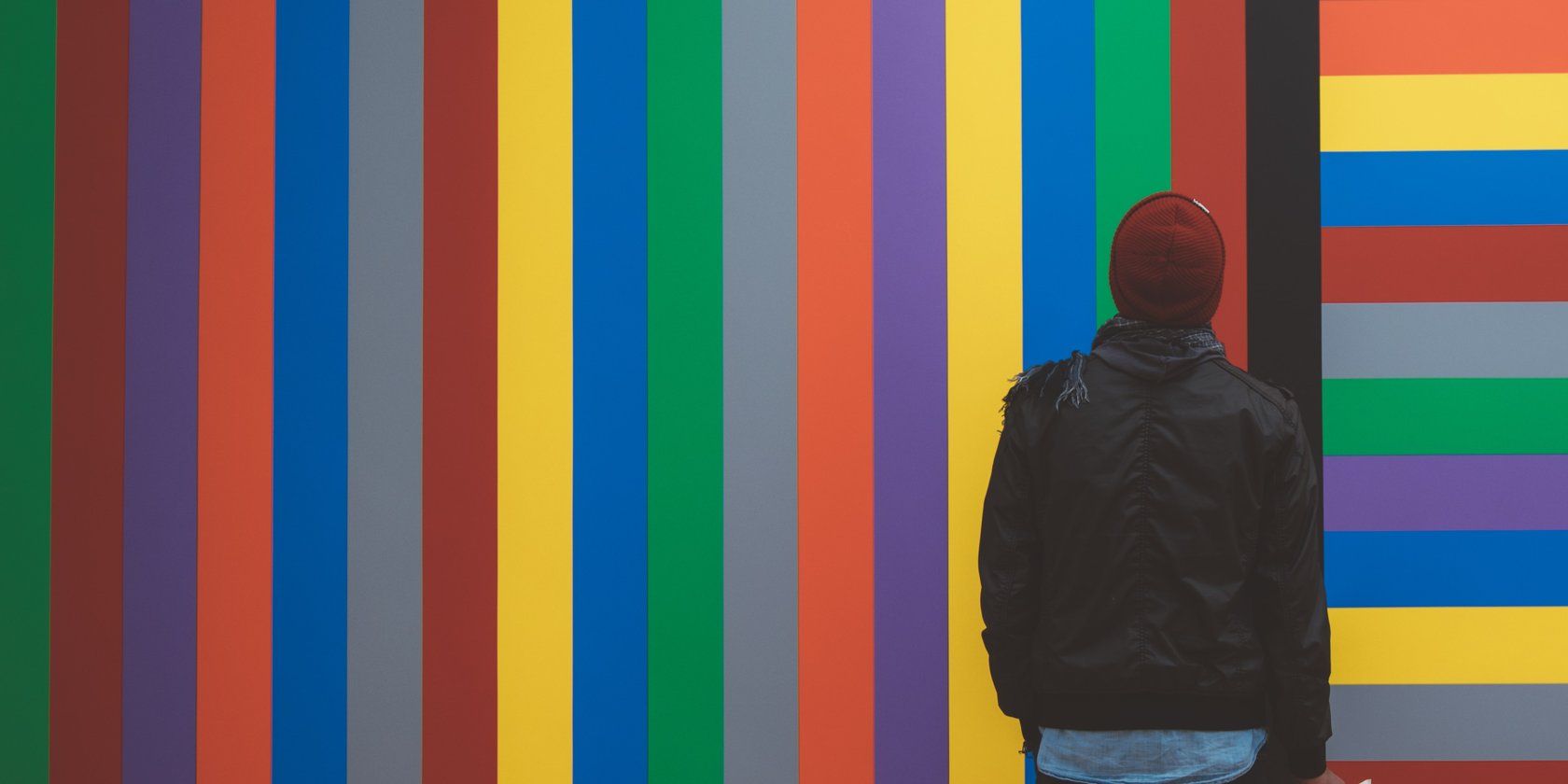 Person staring at colors at a museum
