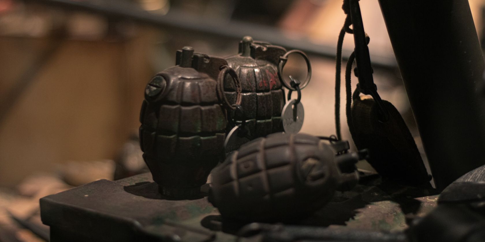 three grenades on a table