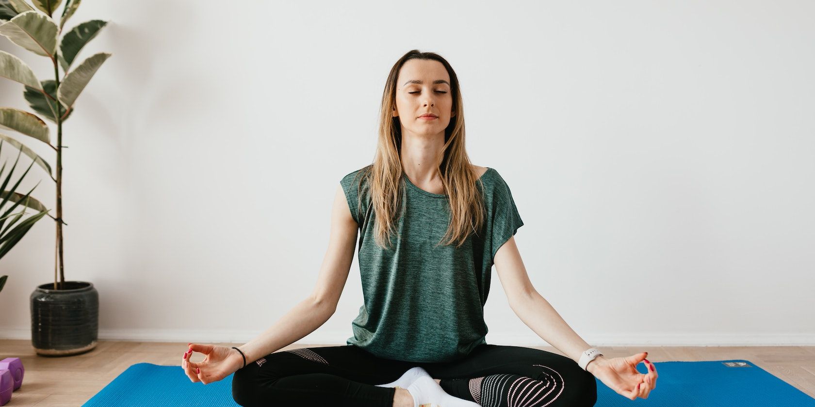 Woman performing meditation and yoga