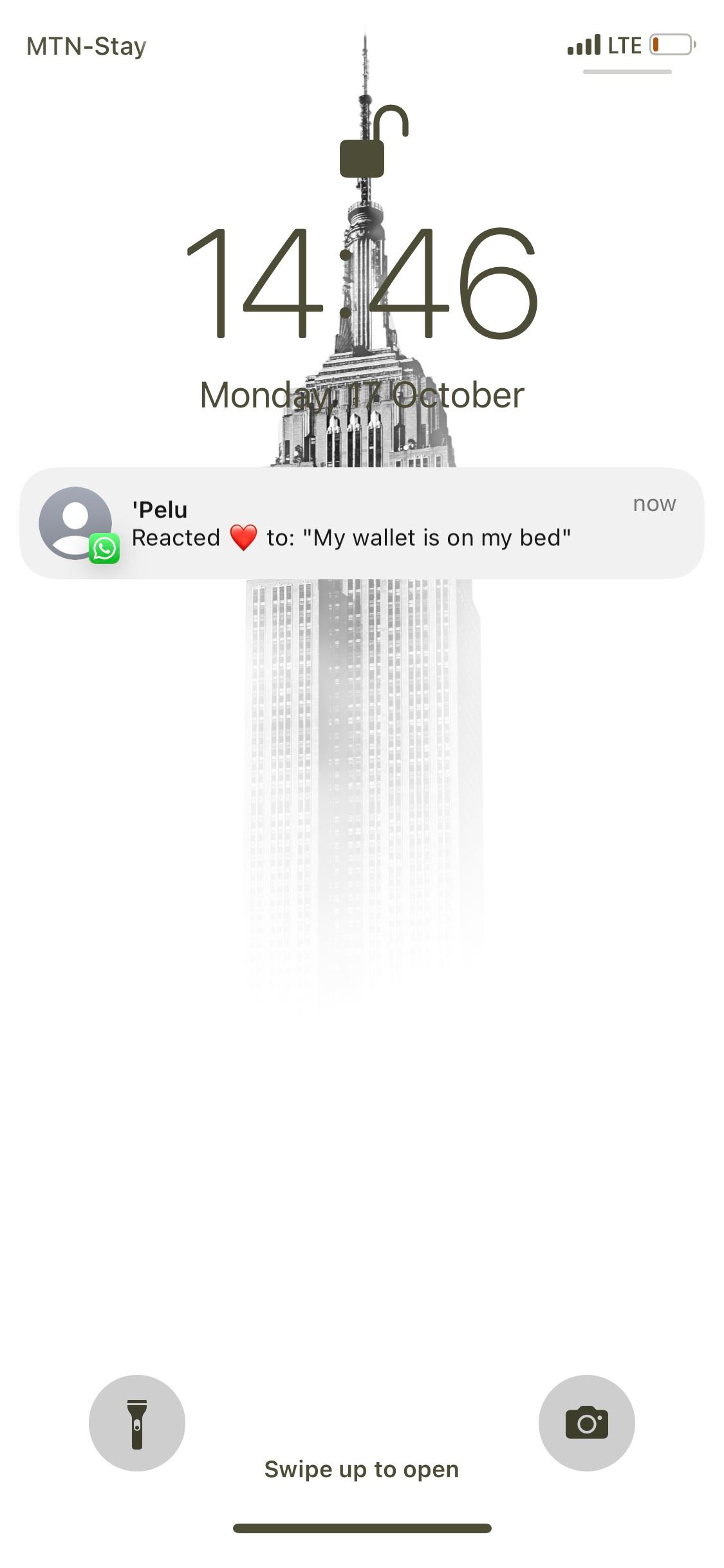 Whatsapp emoji reaction notification on iPhone