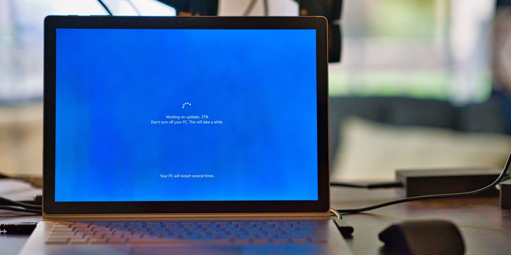 Installing Windows updates on a laptop.
