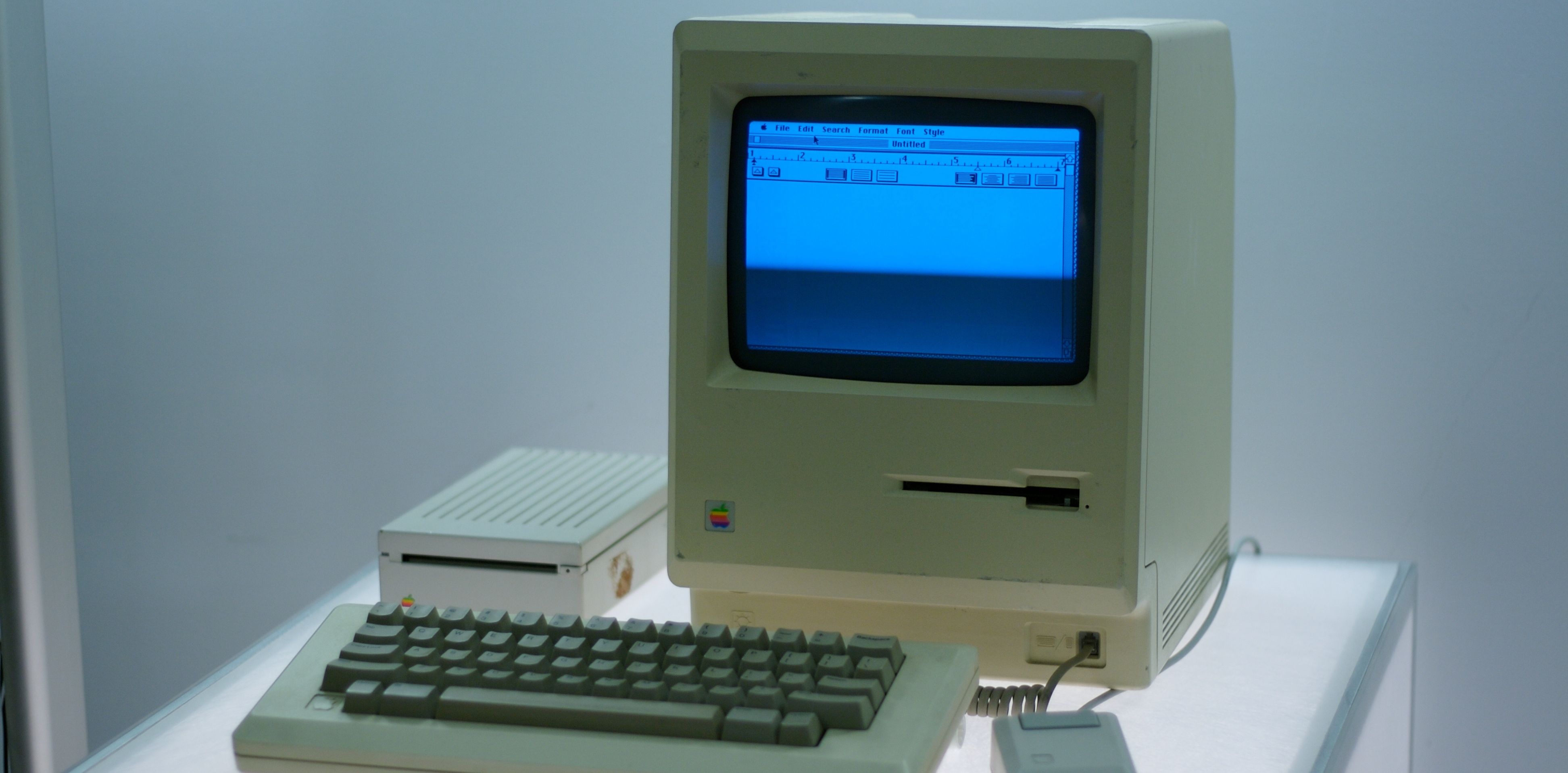Macintosh computer in a display case