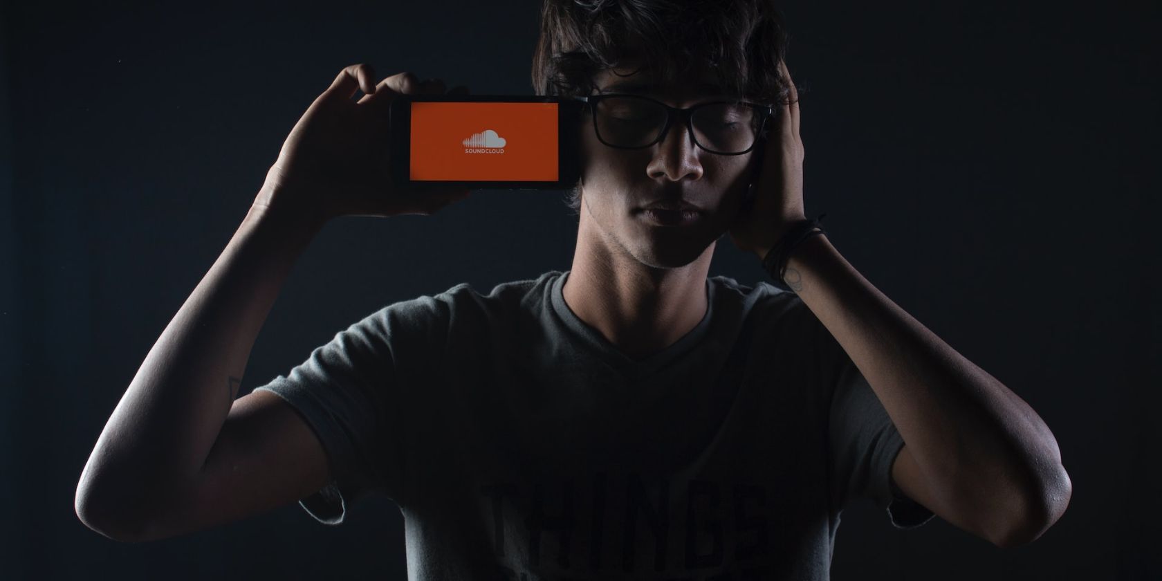 Man listening to music on SoundCloud