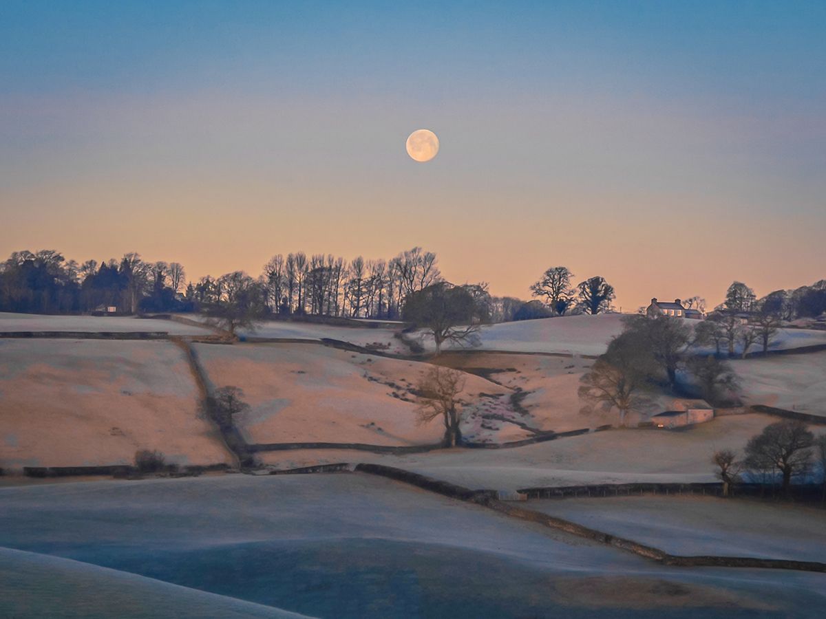 Moon over frosty fields.