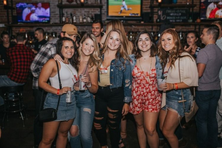 Women in a pub posing for a photo