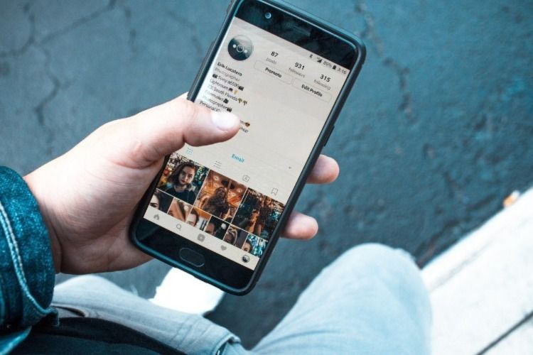 A person using a social site on a smartphone