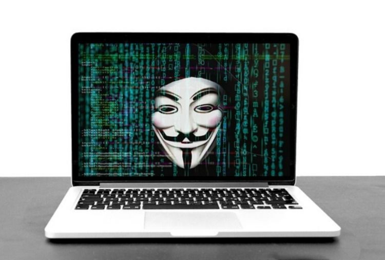 Anonymous hacker face on computer screen