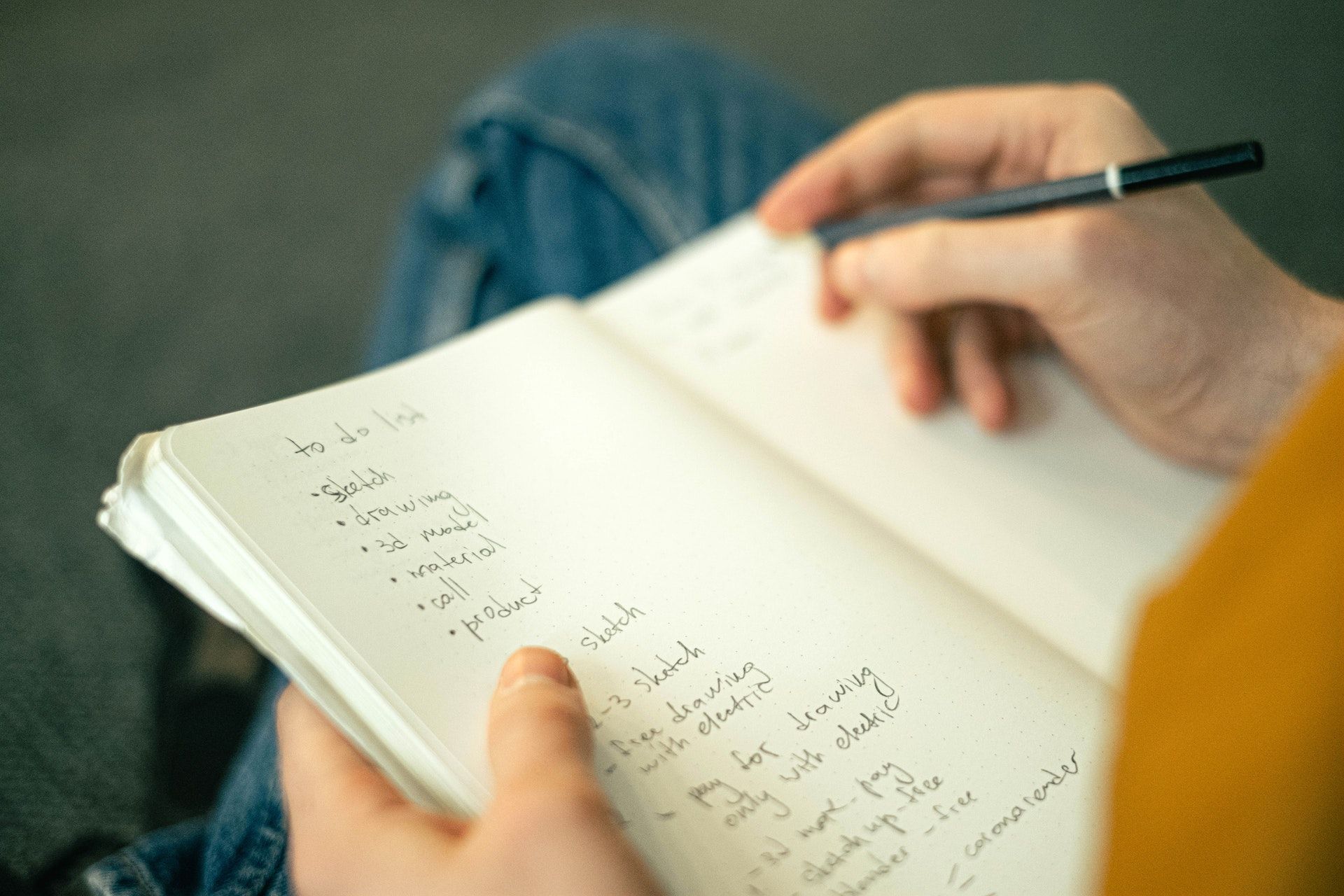 Taking notes on a notebook