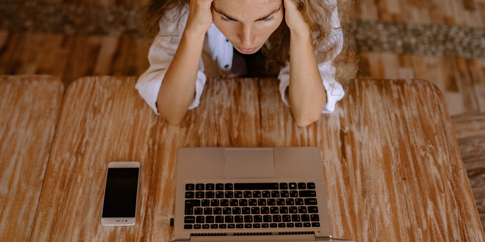 Woman Looking Frustrated at Computer Screen
