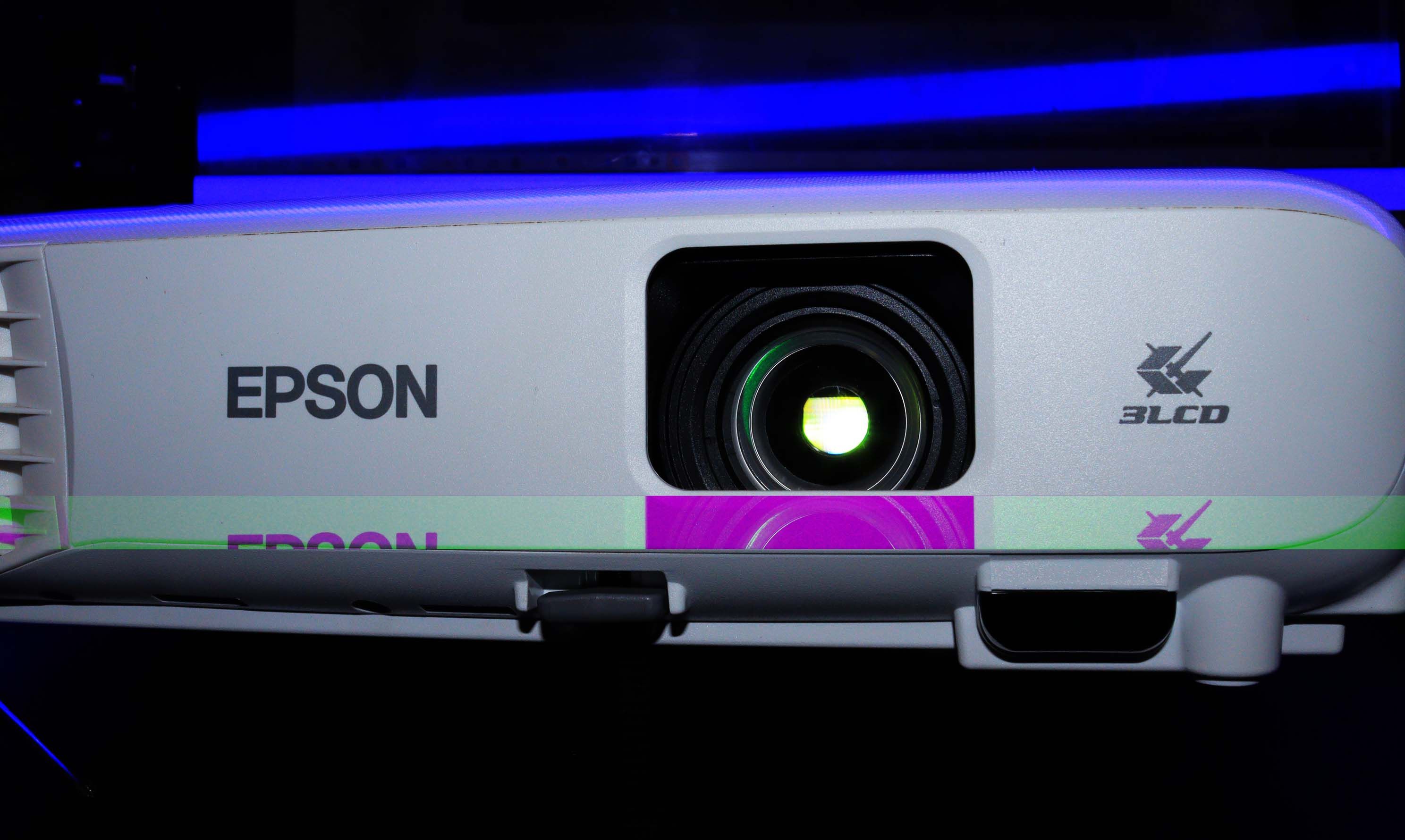 An Epson projector with blue lights on top