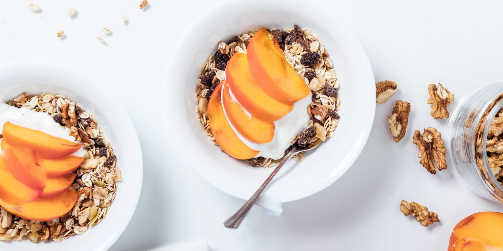 Top view photo of healthy cereal bowl with fruit and yogurt