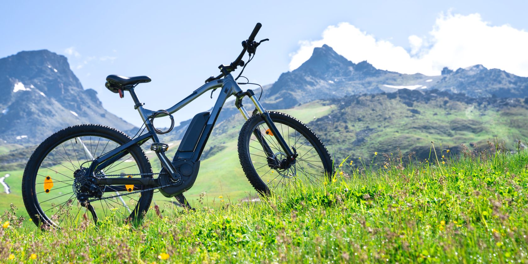 ebike standing with mountain range background feature