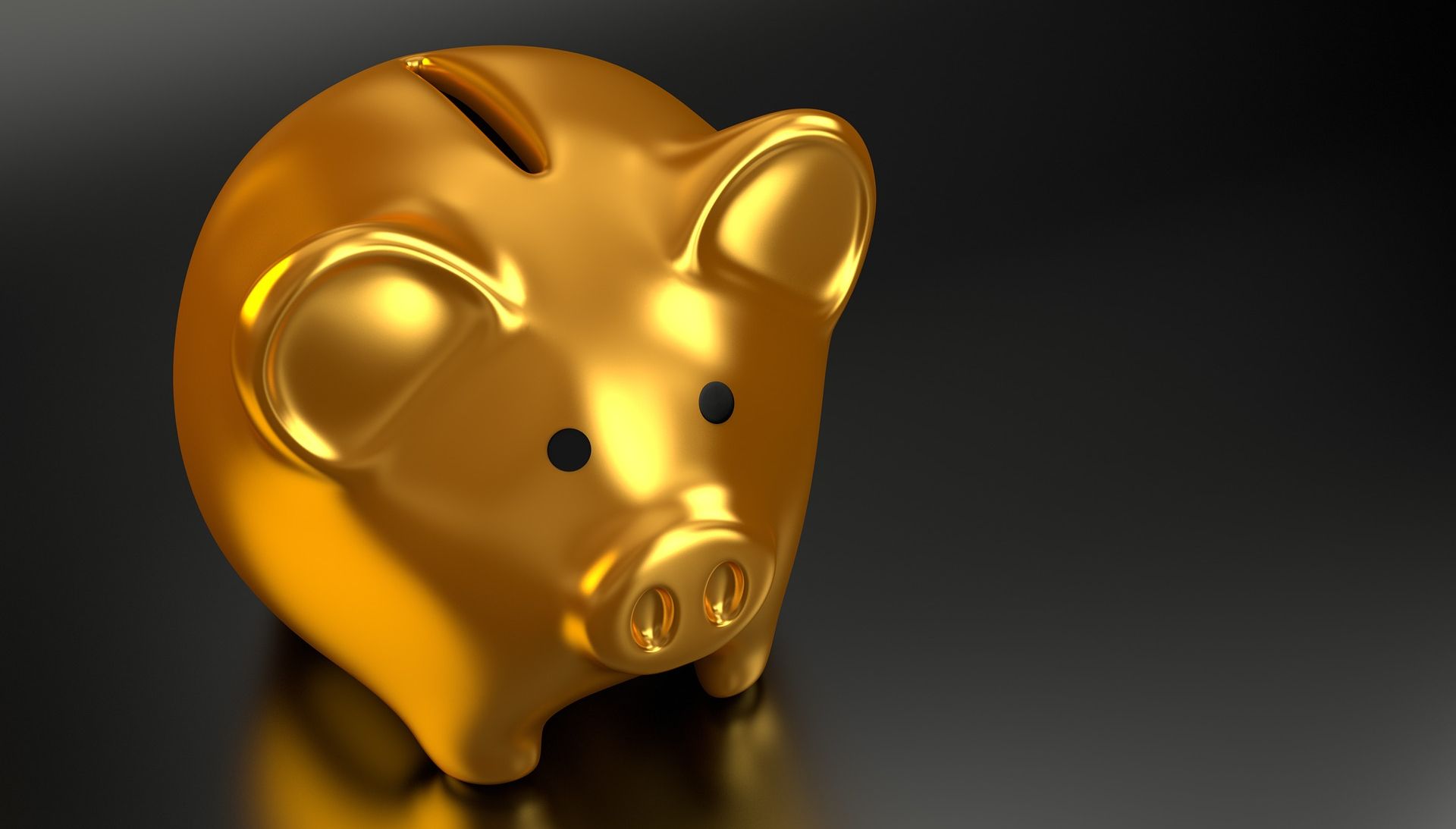 close up shot of gold piggy bank