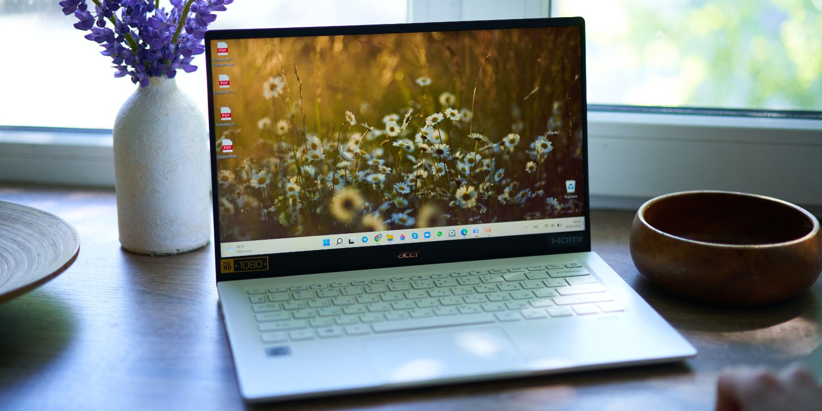 a Window laptop with flower wallpaper