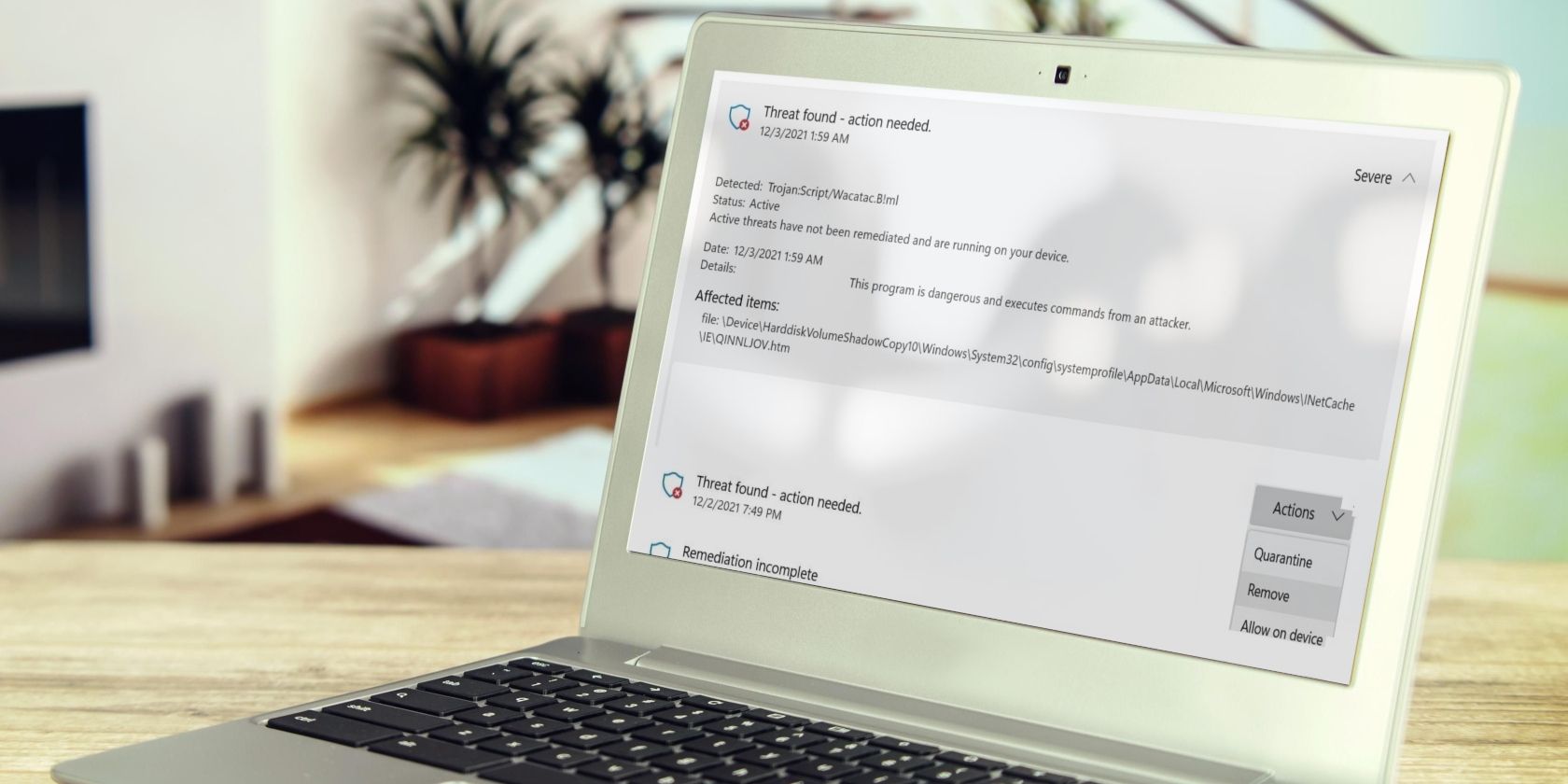 Mockup of a Laptop Showing the Pop-up of Wacatac.B!ml Trojan Virus