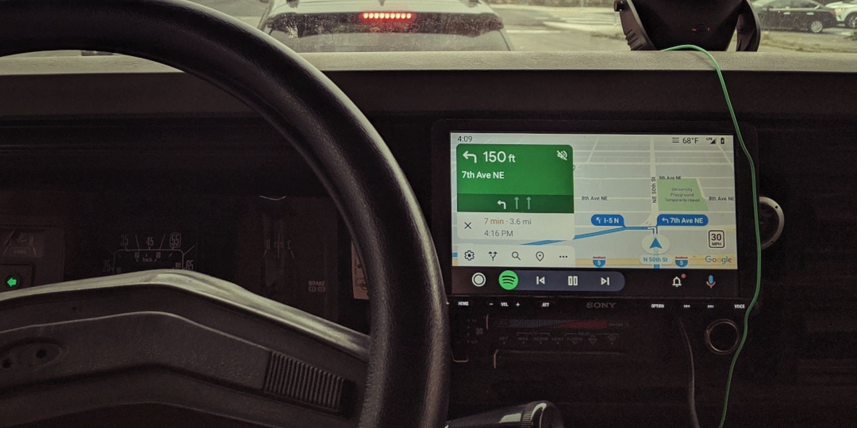 Car dashboard with infotainment showing Android Auto 