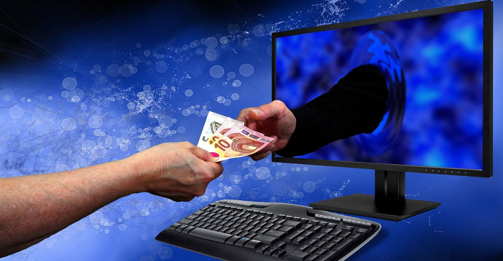 hands exchanging money through computer screen