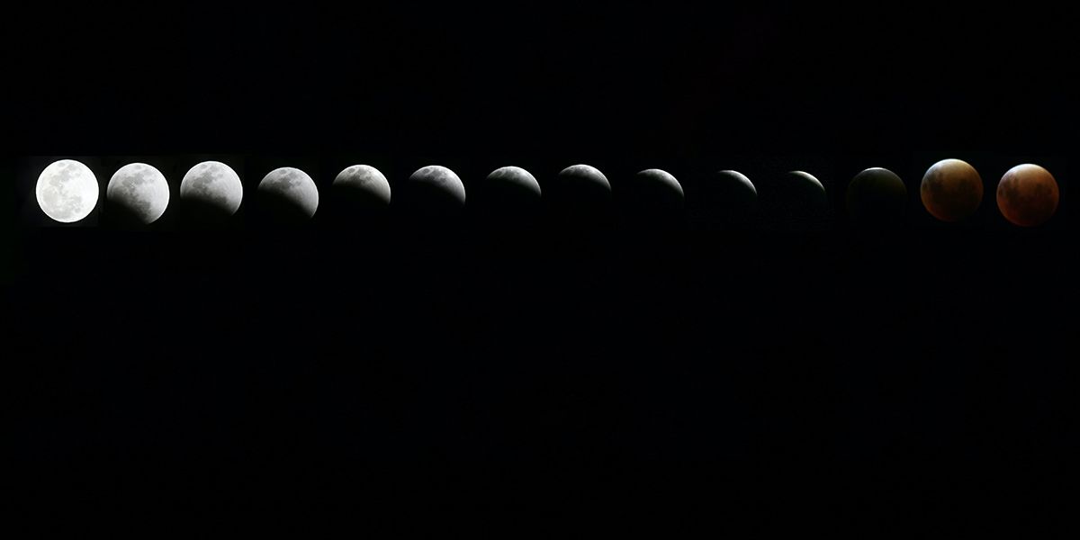 Phases of the moon on black.