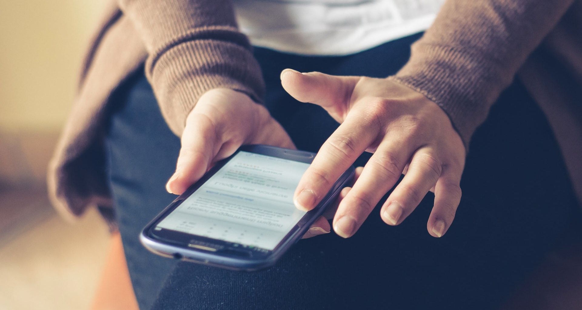 close up shot of person using phone