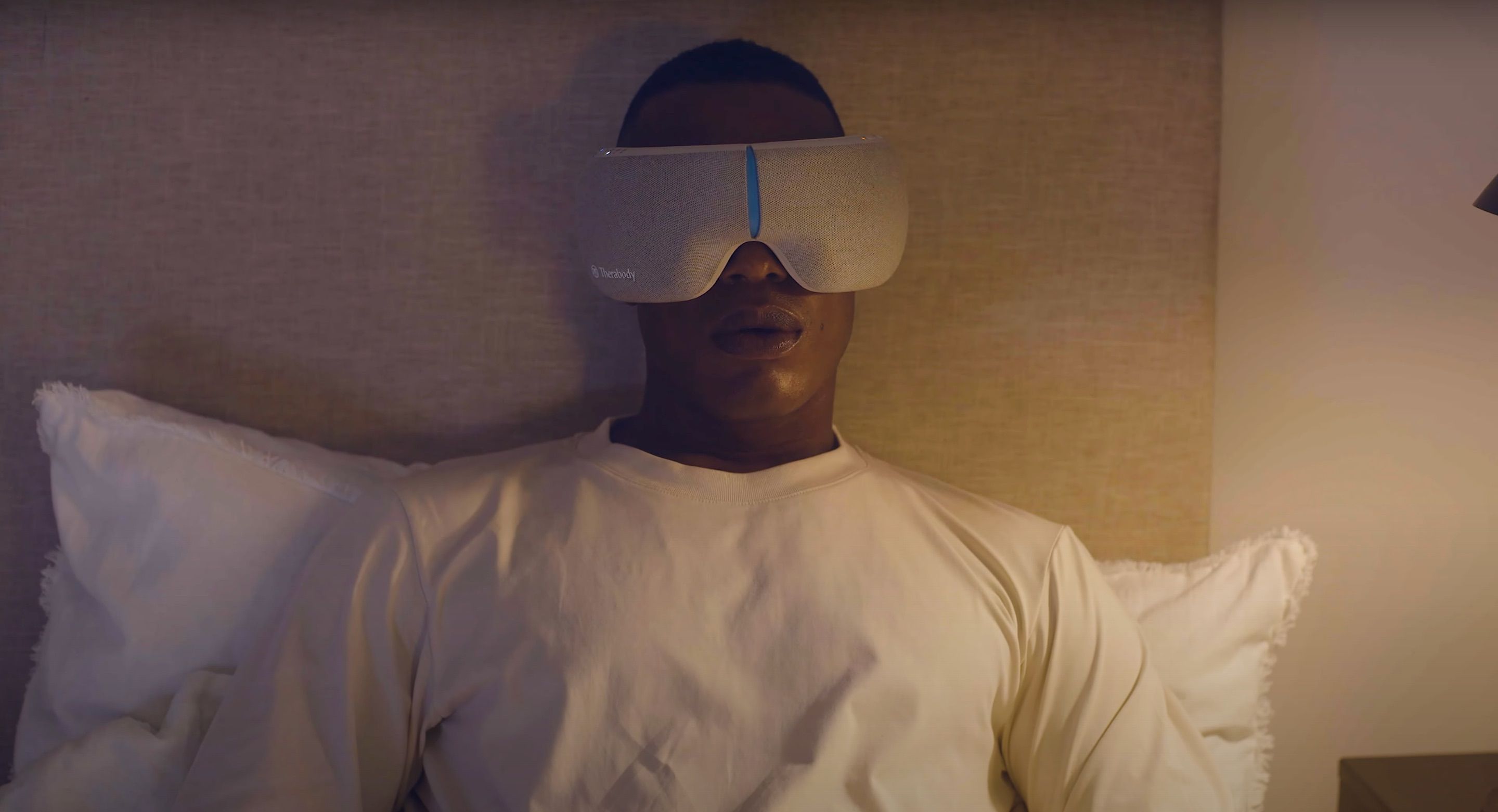 therabody smartgoggles man wearing in bed