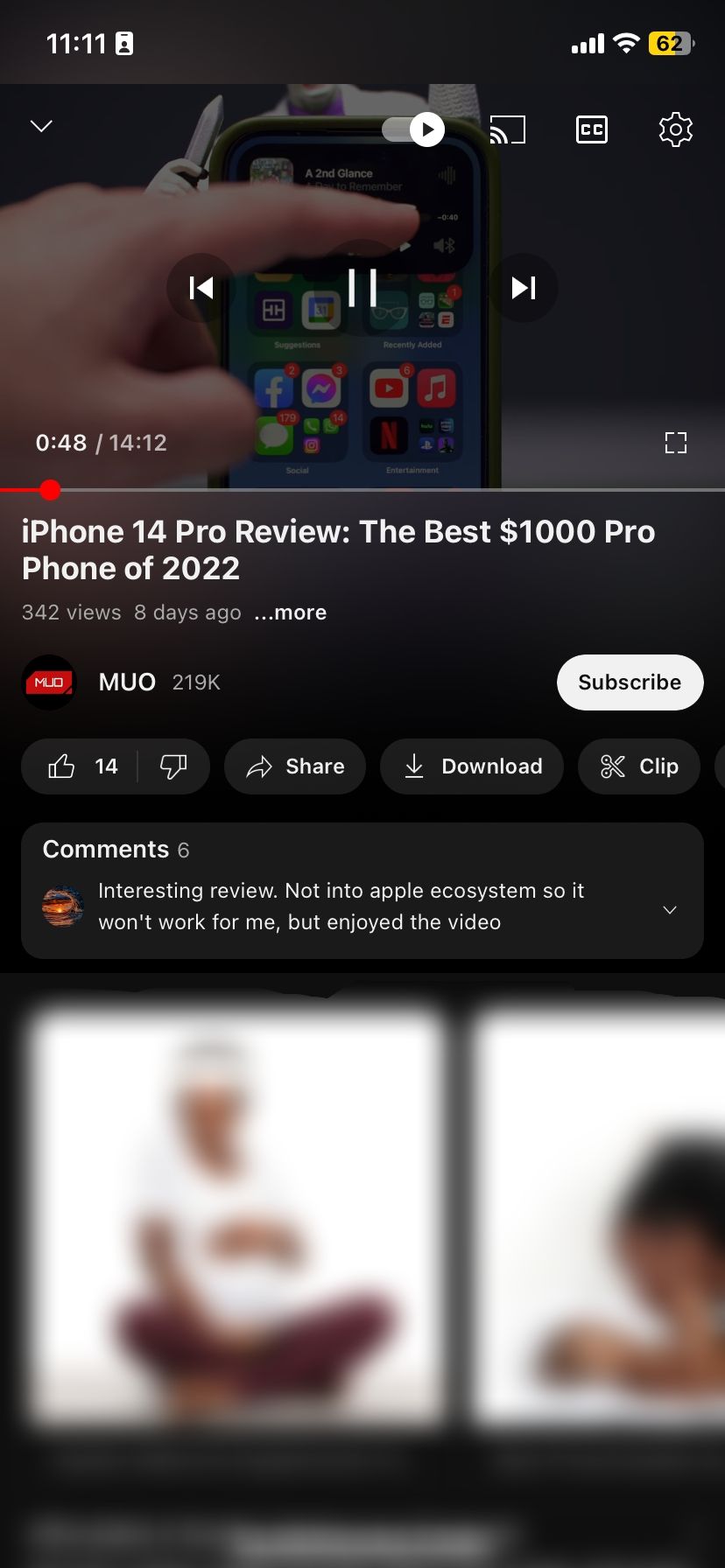 A video playing on YouTube mobile with video controls displaying