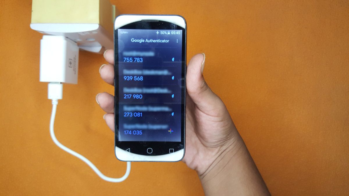 Picture of a phone showing google authenticator