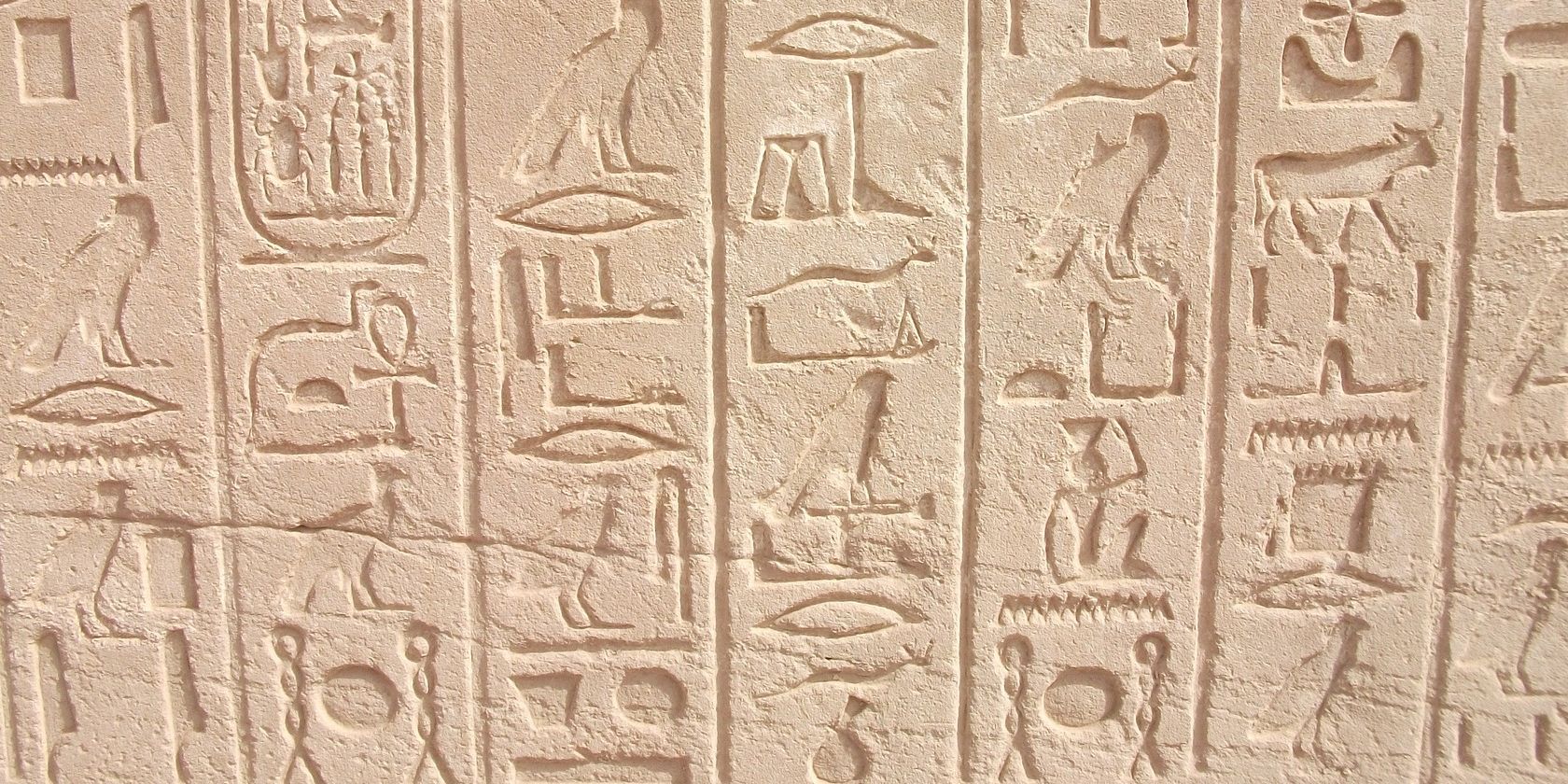 Ancient Egyptian hieroglyphs on the wall