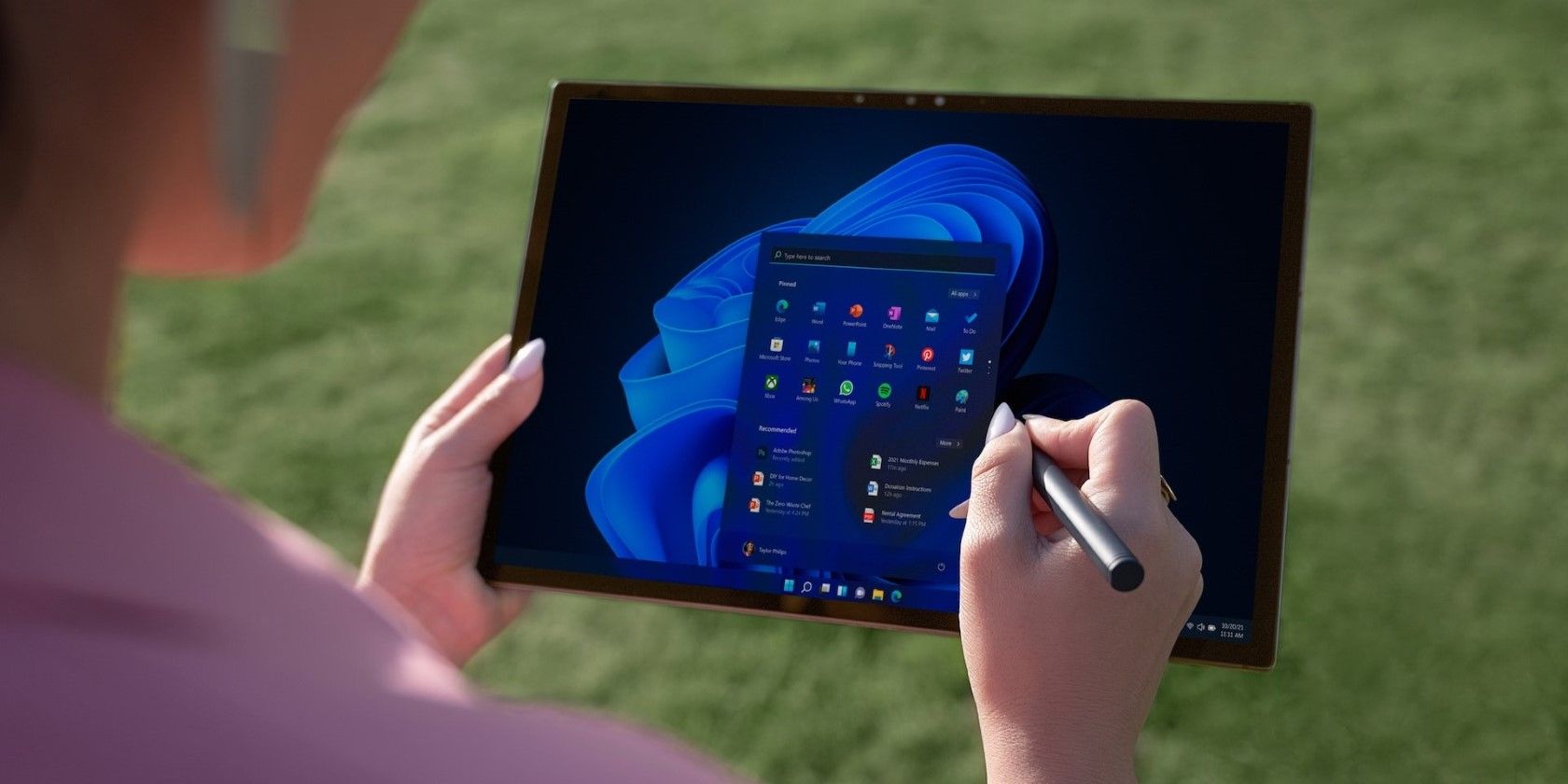 A woman using a windows tablet