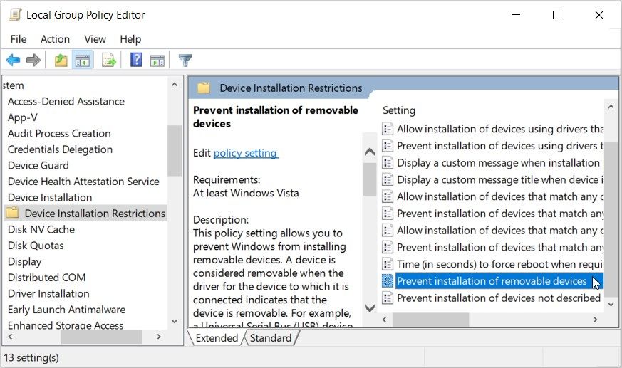 Clicking on the Prevent installation of removable devices option