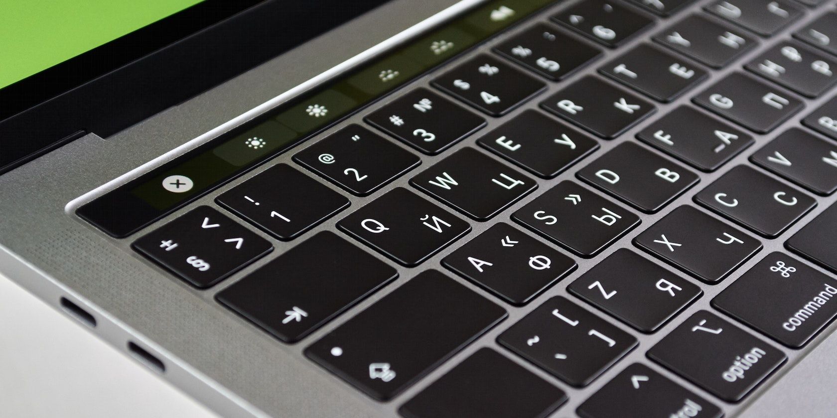 Close up of a MacBook keyboard and touch bar