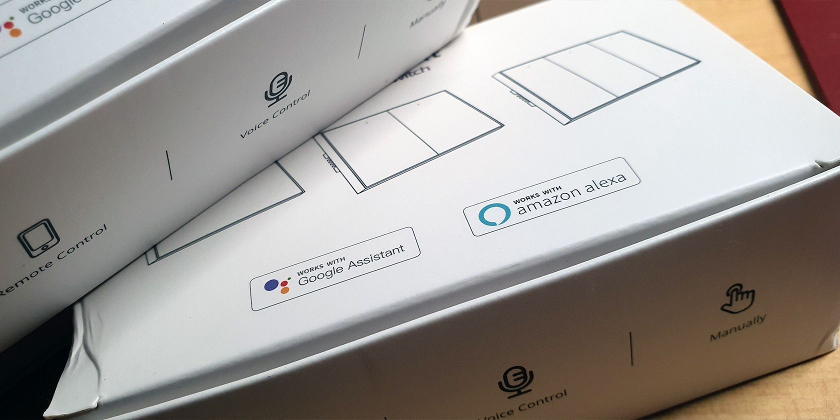 Google Assistant and Amazon Alexa certifications on a box for a smart device