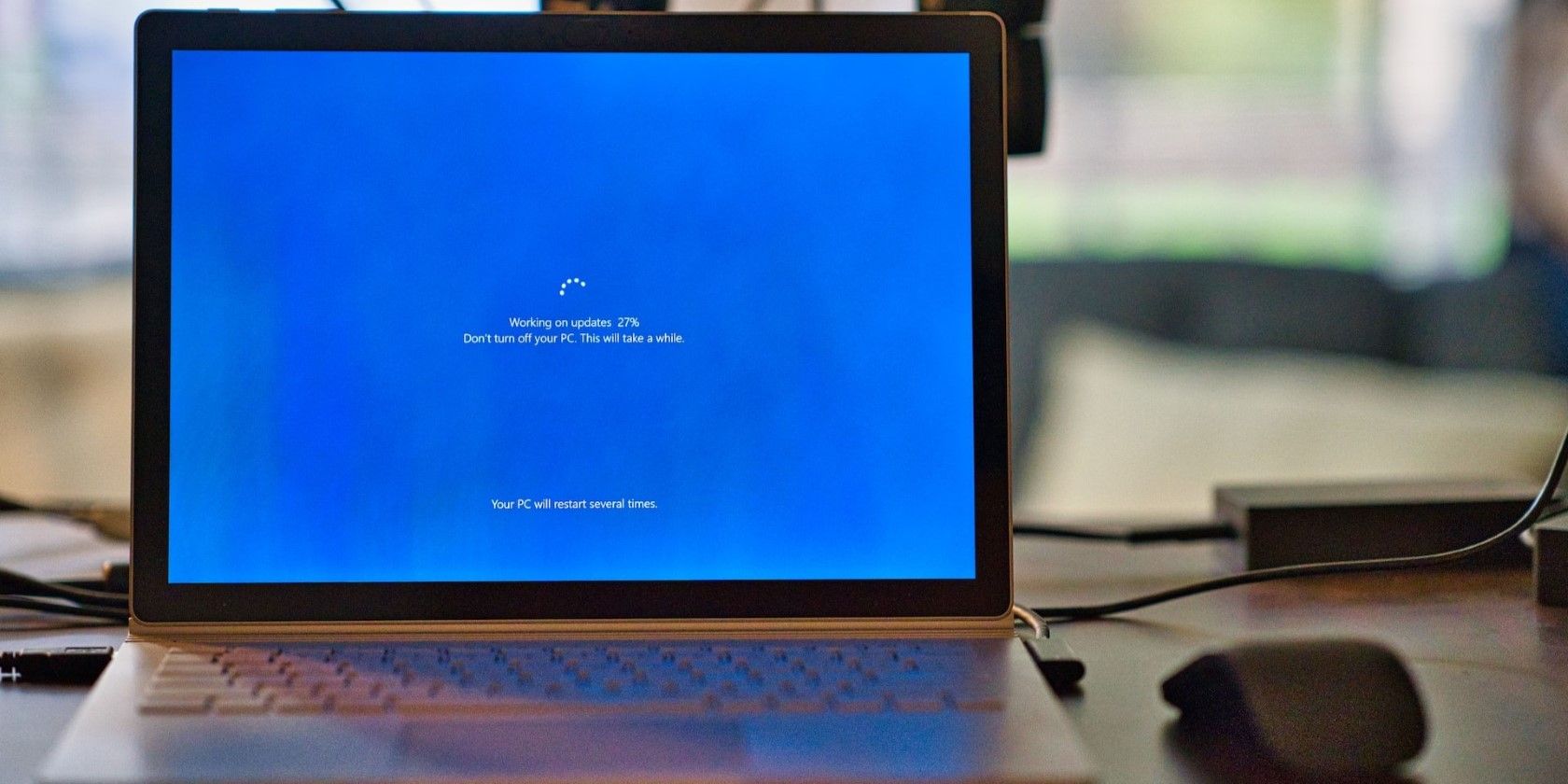 A Windows laptop installing updates