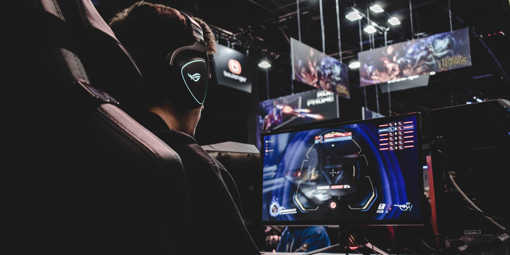 Man playing Video Games on a Gaming Monitor
