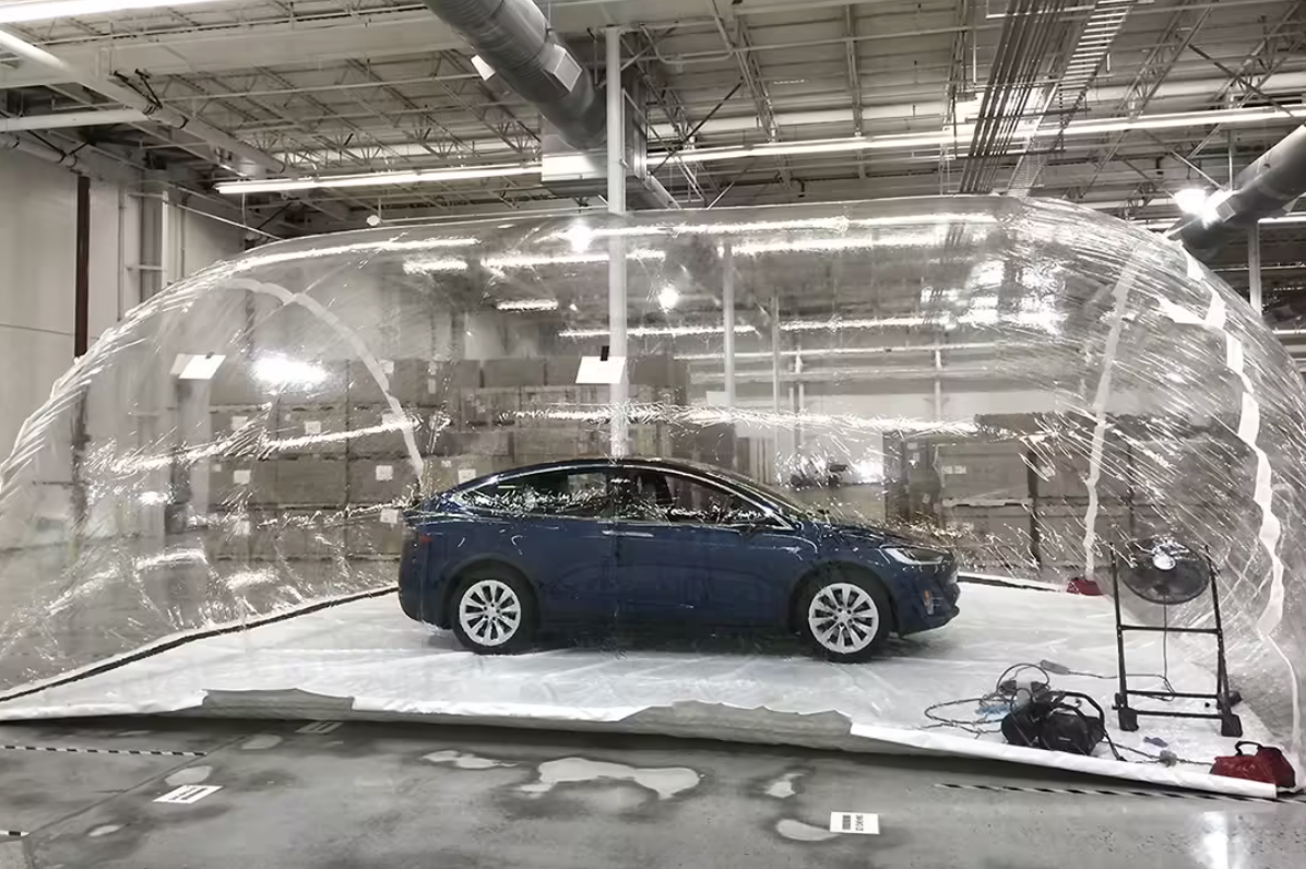 A Tesla inside a bubble is being tested for air filtration capability. 