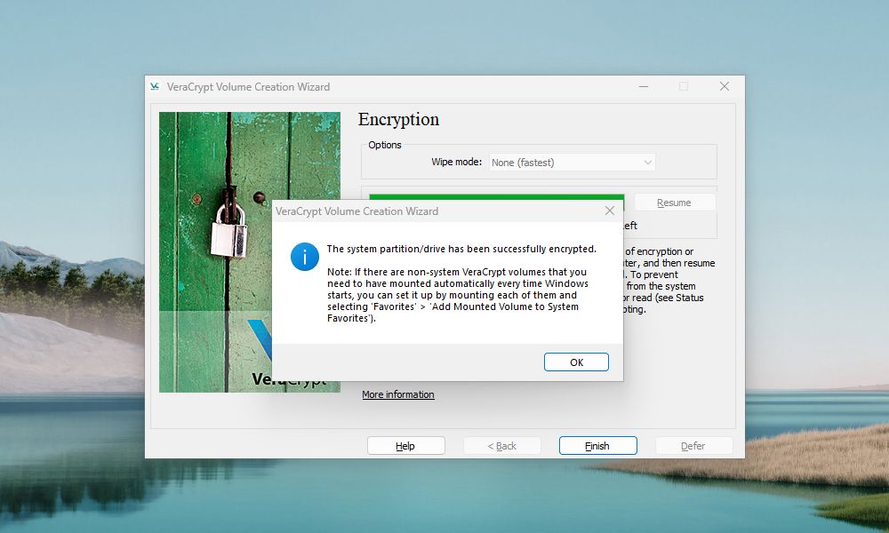 VeraCrypt Volume Creation Wizard pop-up notifying that the system drive encryption was successful