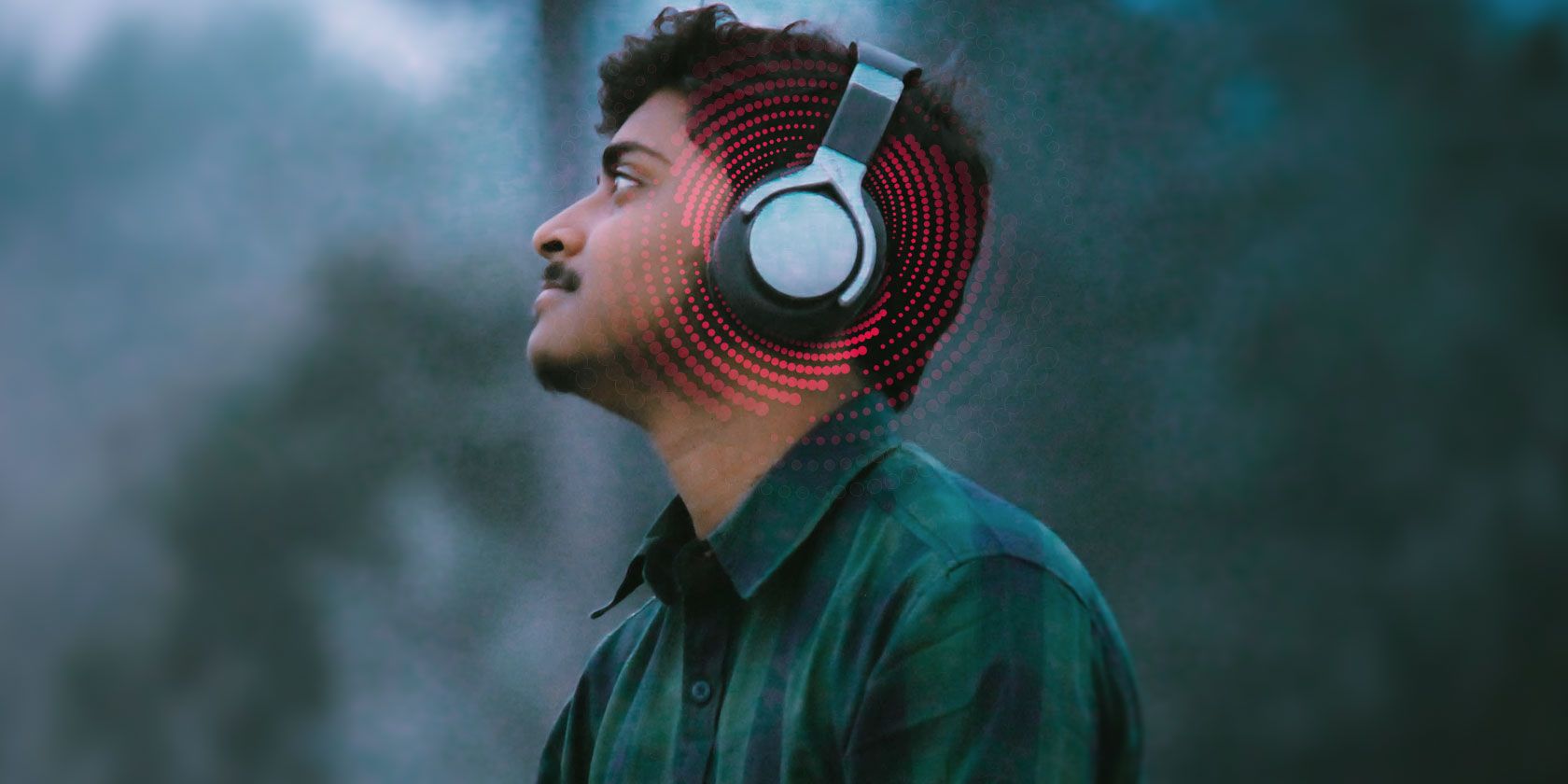 Man with listening to headphones 