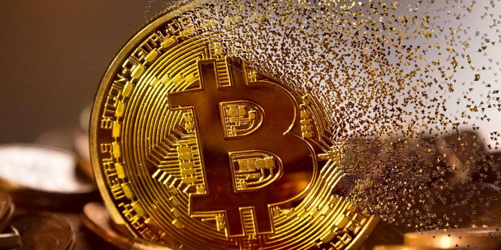 gold bitcoin being split into fragments